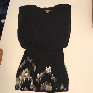 Black holiday dress with sequins.